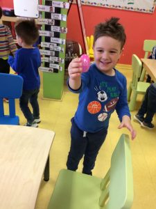 Toddler happy to hold his easter egg