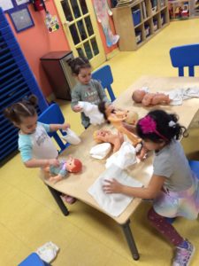 Children learning about baby diapers