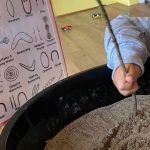 Toddler doing an activity on indigenous day