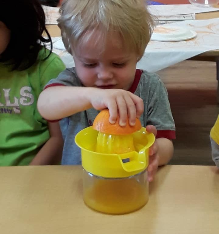 Ben Making orange juice