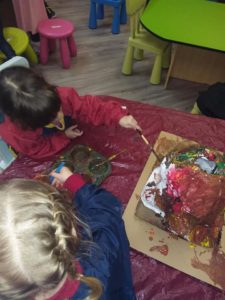 Kids painting volcano
