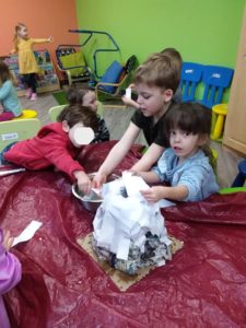Kids making a volcano