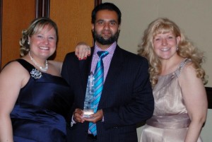 Rashid, Brigida and Teresa of Tiny Hoppers at an award ceremony