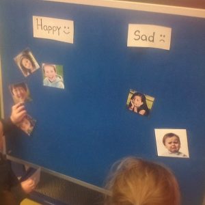 kids looking at a board